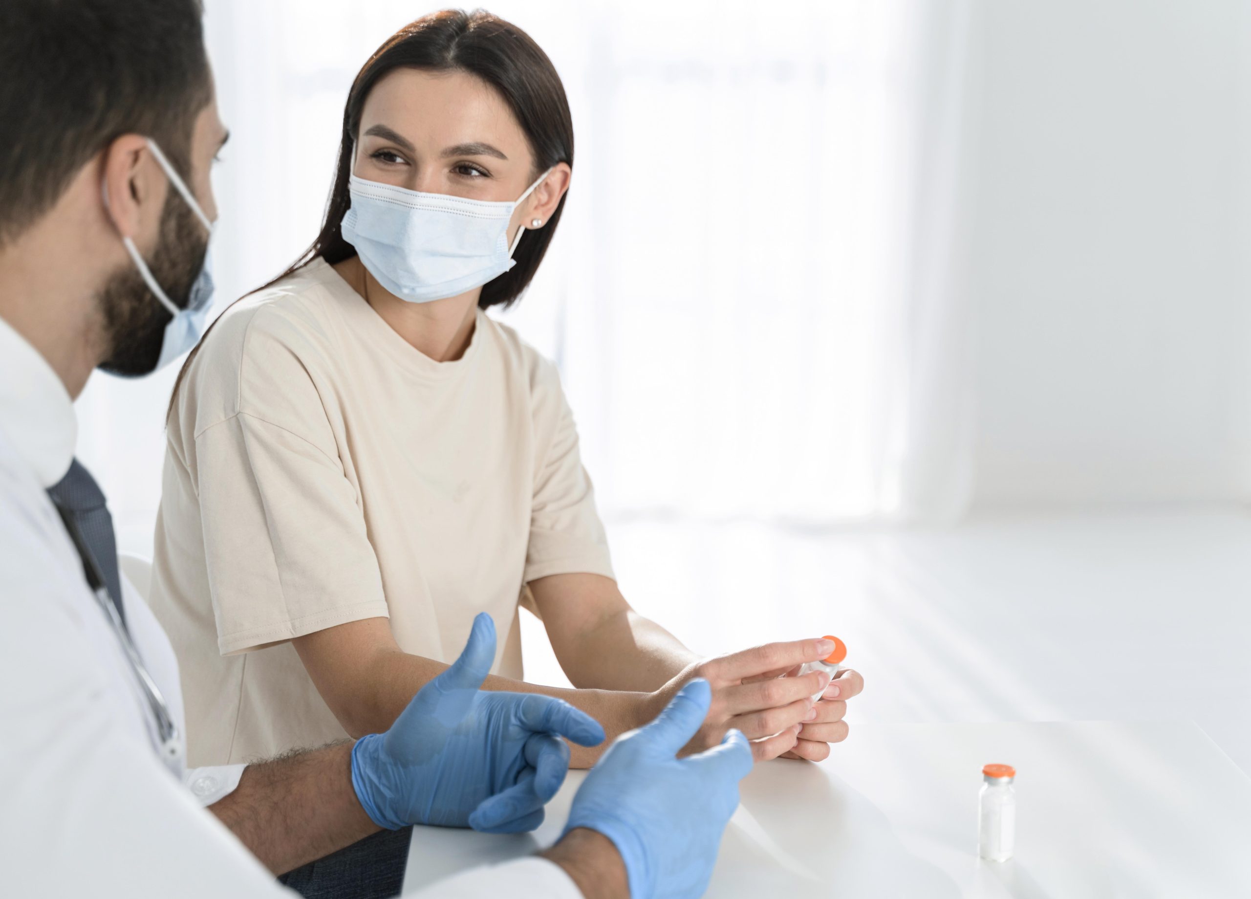 Doctor Discussing Pilonidal Cyst Care and Treatment with Patient